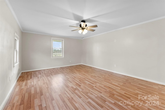 spare room with light hardwood / wood-style floors, ceiling fan, and ornamental molding