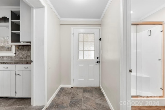 doorway to outside featuring crown molding