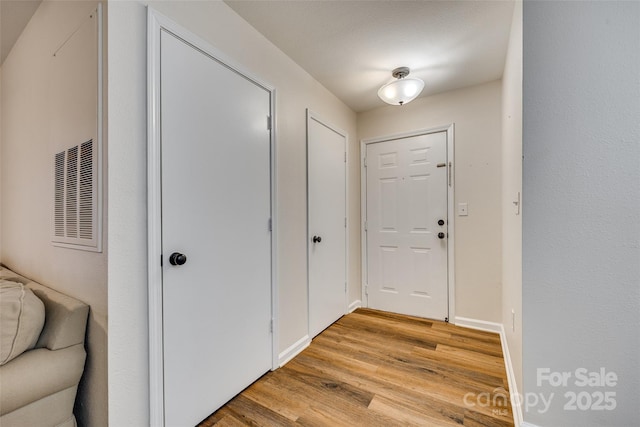 doorway featuring light hardwood / wood-style flooring