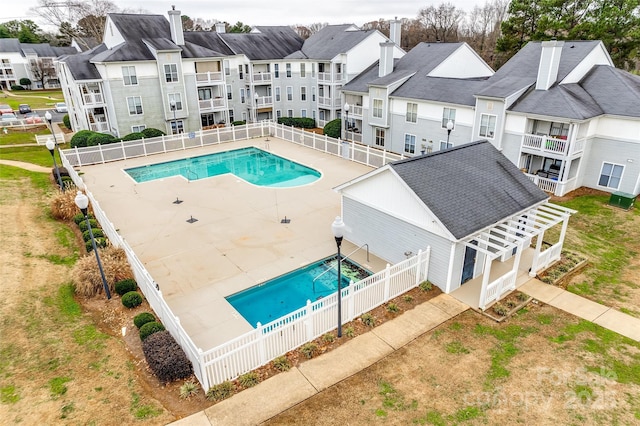 view of swimming pool with a patio