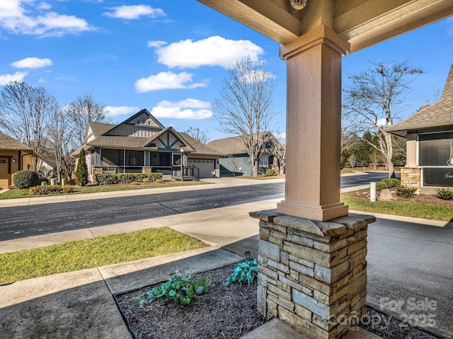 view of patio featuring a garage