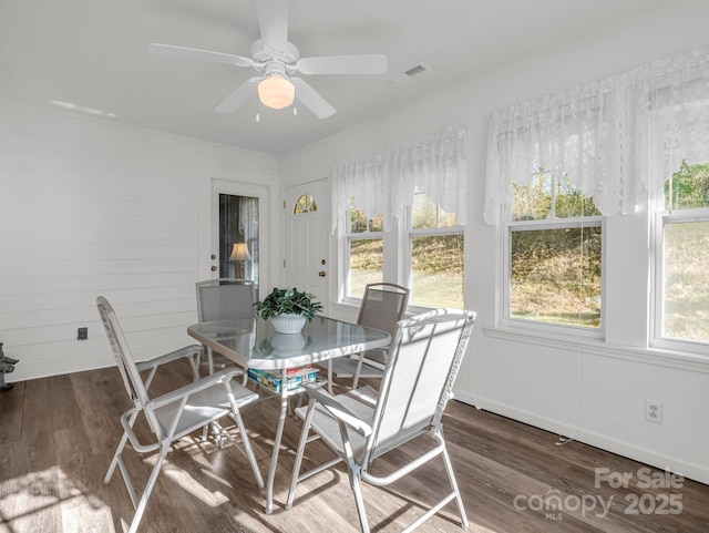 sunroom / solarium with ceiling fan