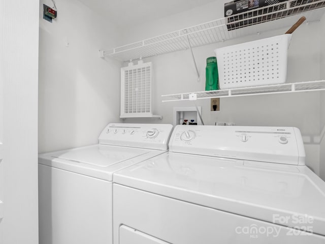 laundry area featuring washer and clothes dryer