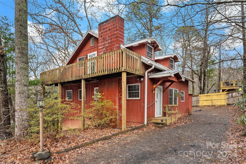 view of property exterior with a balcony