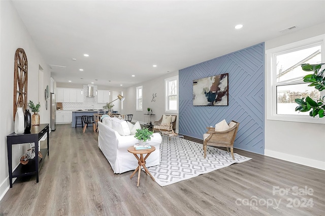 living room with light hardwood / wood-style floors