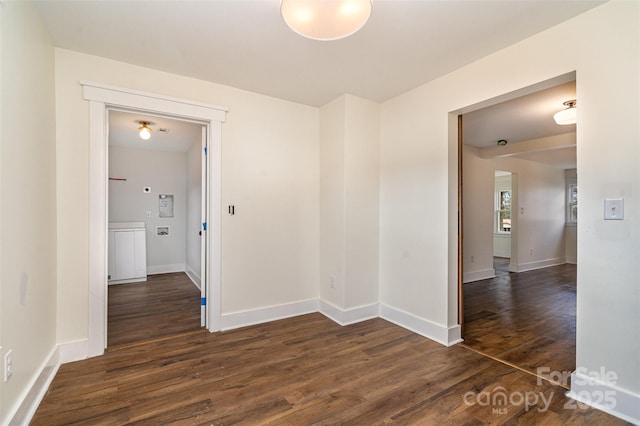 corridor featuring dark hardwood / wood-style flooring