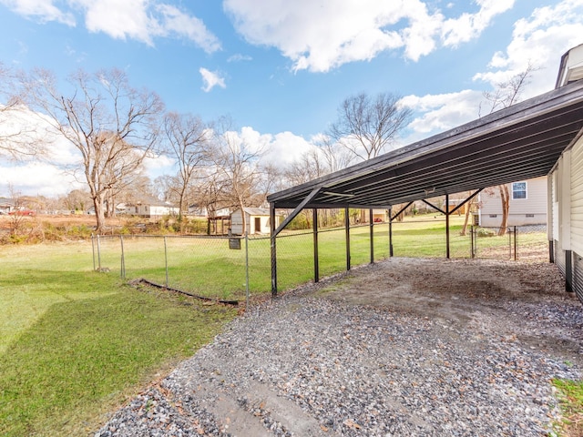 view of yard with a carport