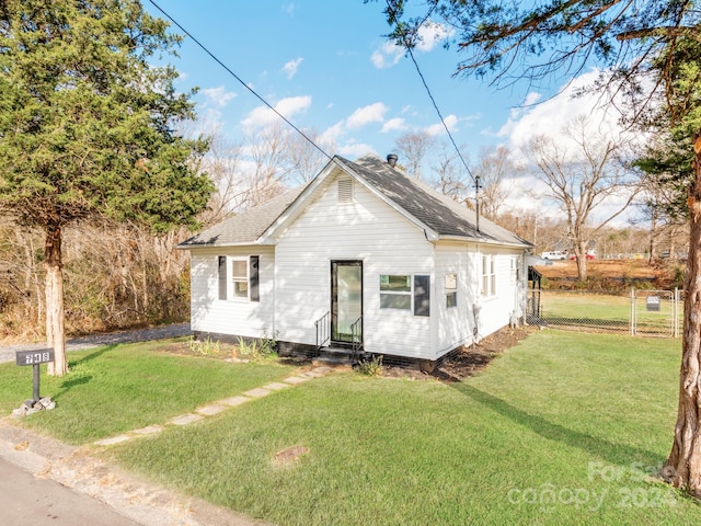 exterior space with a front yard