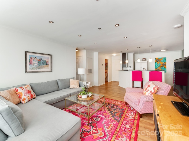 living room featuring light hardwood / wood-style floors