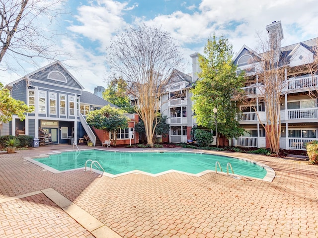 view of pool featuring a patio