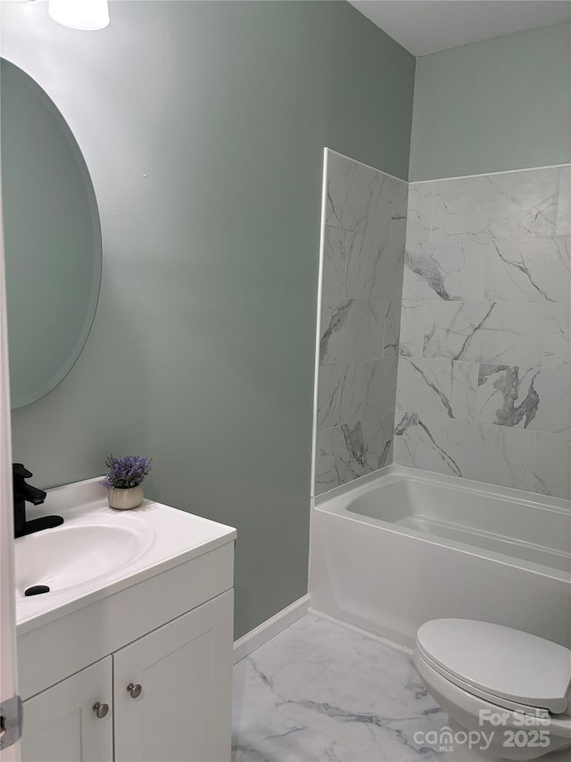 full bathroom featuring washtub / shower combination, vanity, and toilet