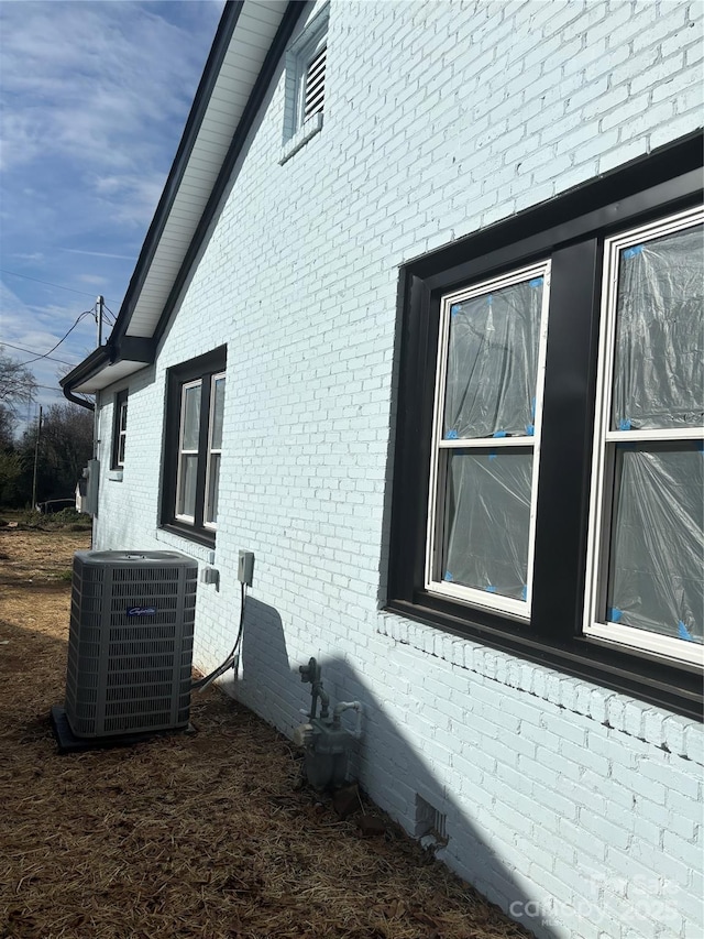 view of home's exterior featuring central air condition unit