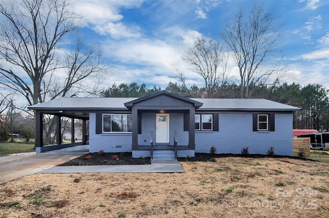 view of front of property with a carport