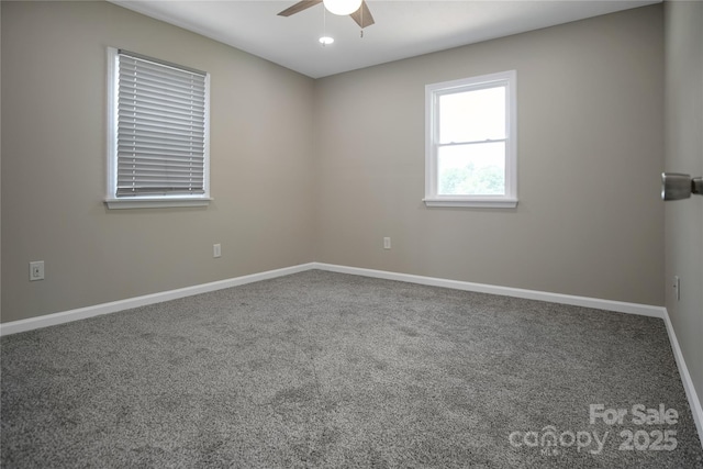 carpeted empty room with ceiling fan