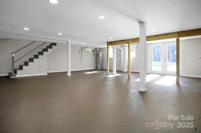 basement with electric water heater and french doors