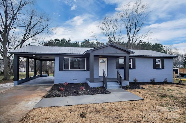 view of front of home featuring a carport