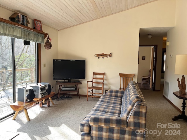 carpeted living room with wooden ceiling and vaulted ceiling