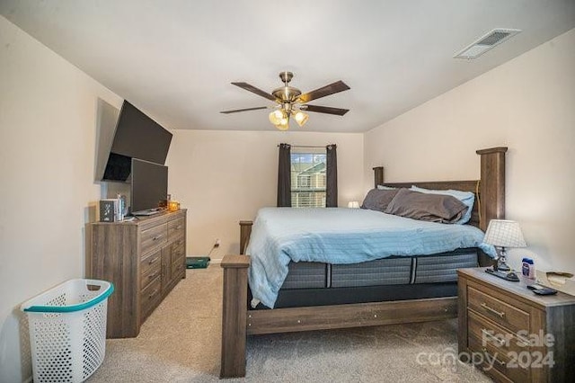 bedroom featuring ceiling fan and light colored carpet