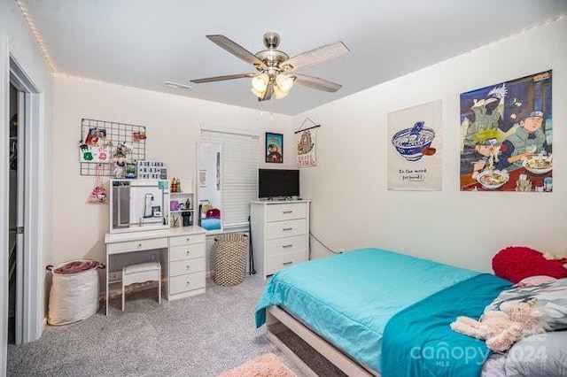 carpeted bedroom featuring ceiling fan