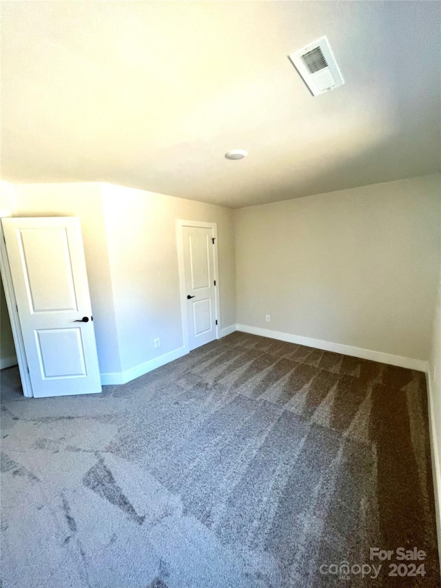 empty room with carpet floors