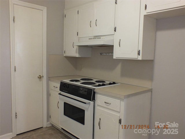 kitchen featuring under cabinet range hood, white cabinets, white range with electric cooktop, and light countertops