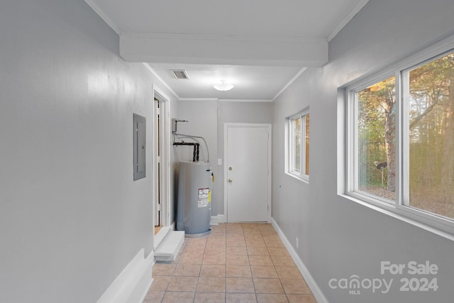 hall with light tile patterned floors, electric panel, ornamental molding, and water heater