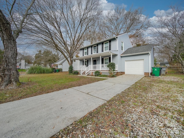 front facade with a front yard, a garage, and a porch