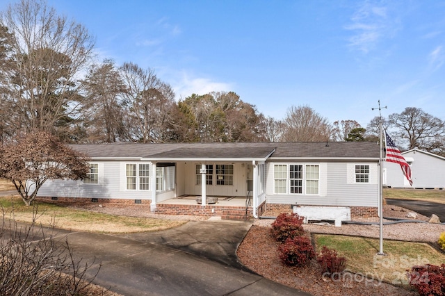 ranch-style home with covered porch