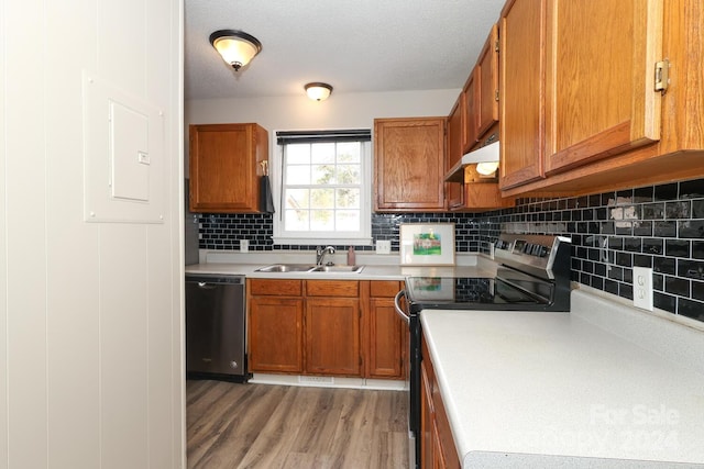 kitchen with dishwasher, backsplash, sink, electric range, and wood-type flooring