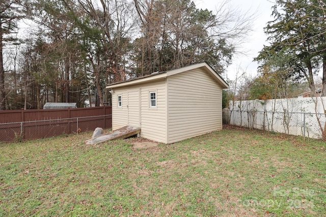 view of outdoor structure featuring a yard