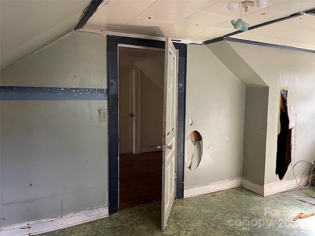 bonus room featuring lofted ceiling