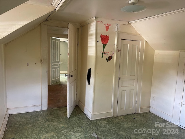 bonus room featuring vaulted ceiling