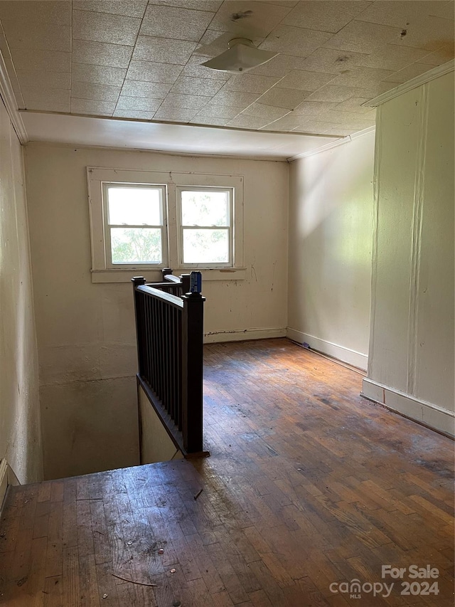 unfurnished room featuring wood-type flooring