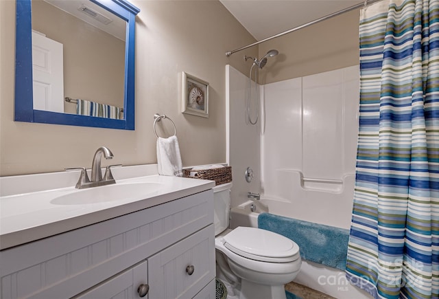 full bathroom featuring vanity, toilet, and shower / bathtub combination with curtain