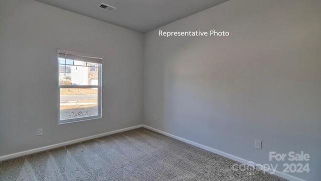 view of carpeted spare room