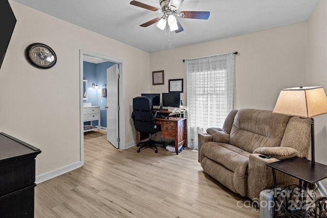 office area with ceiling fan and light hardwood / wood-style flooring