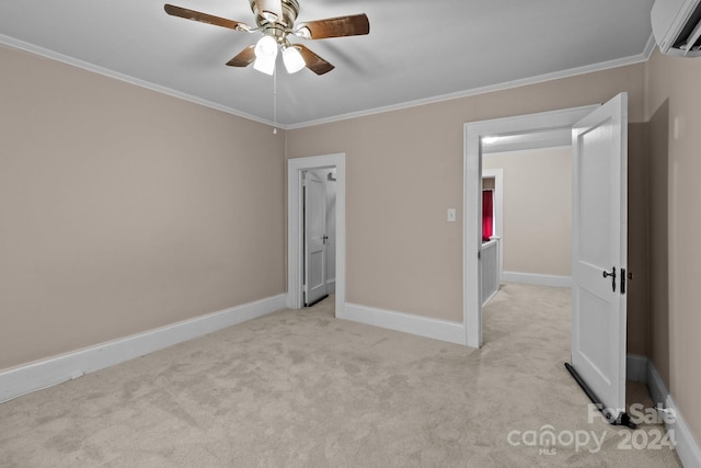 unfurnished bedroom featuring ceiling fan, light colored carpet, an AC wall unit, and crown molding