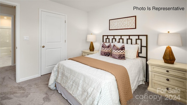 bedroom featuring light colored carpet