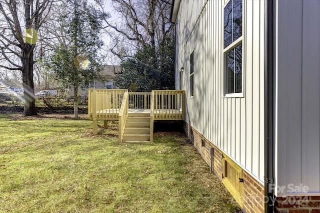 view of yard with a deck