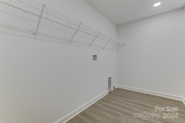 washroom featuring washer hookup and hardwood / wood-style floors