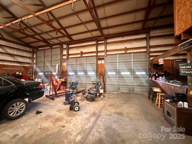 garage featuring a carport