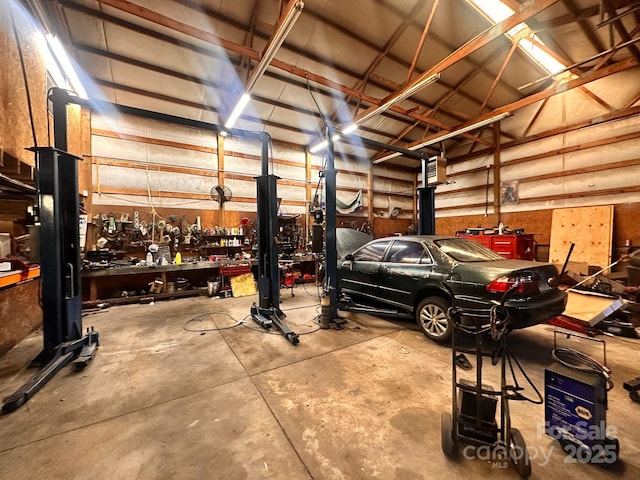 garage with a workshop area