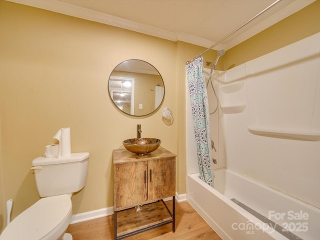 full bathroom with vanity, shower / tub combo with curtain, crown molding, wood-type flooring, and toilet