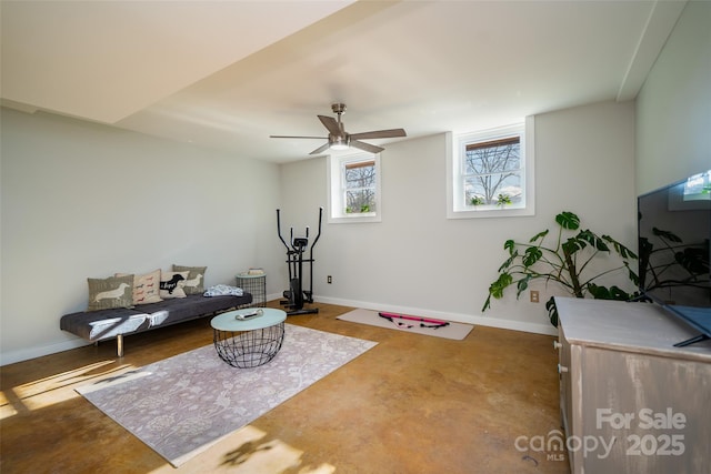 workout room featuring ceiling fan