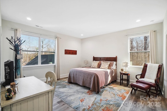 bedroom featuring hardwood / wood-style flooring