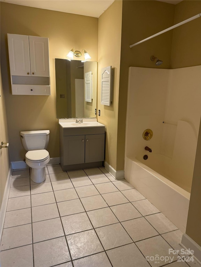 full bathroom featuring toilet, shower / tub combination, vanity, and tile patterned floors