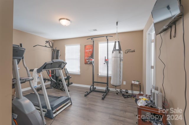 exercise area with hardwood / wood-style floors