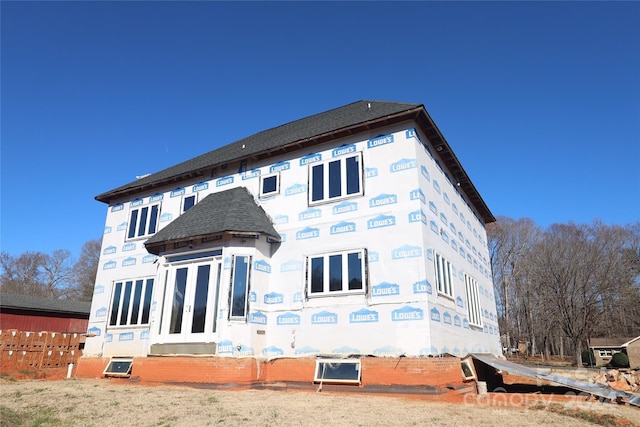 back of property with french doors