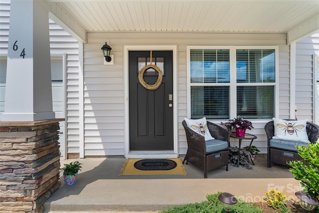 entrance to property with a porch