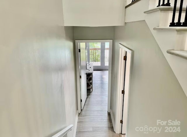 hallway featuring light hardwood / wood-style flooring